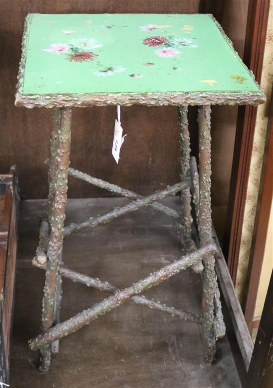 A rustic pattern table, the rectangular top painted with flowers on a blue ground, W.1ft 5in.
